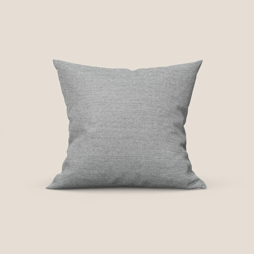 Coussin Tobago disponible en plusieurs couleurs, fabriqué en tissu flammé simili coton imperméable T19 gris.